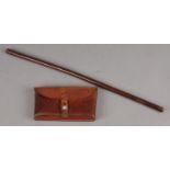 A Leather Coated Swagger Stick, together with a Swiss Leather Dispatch Pouch. Length of Stick: 61cm.