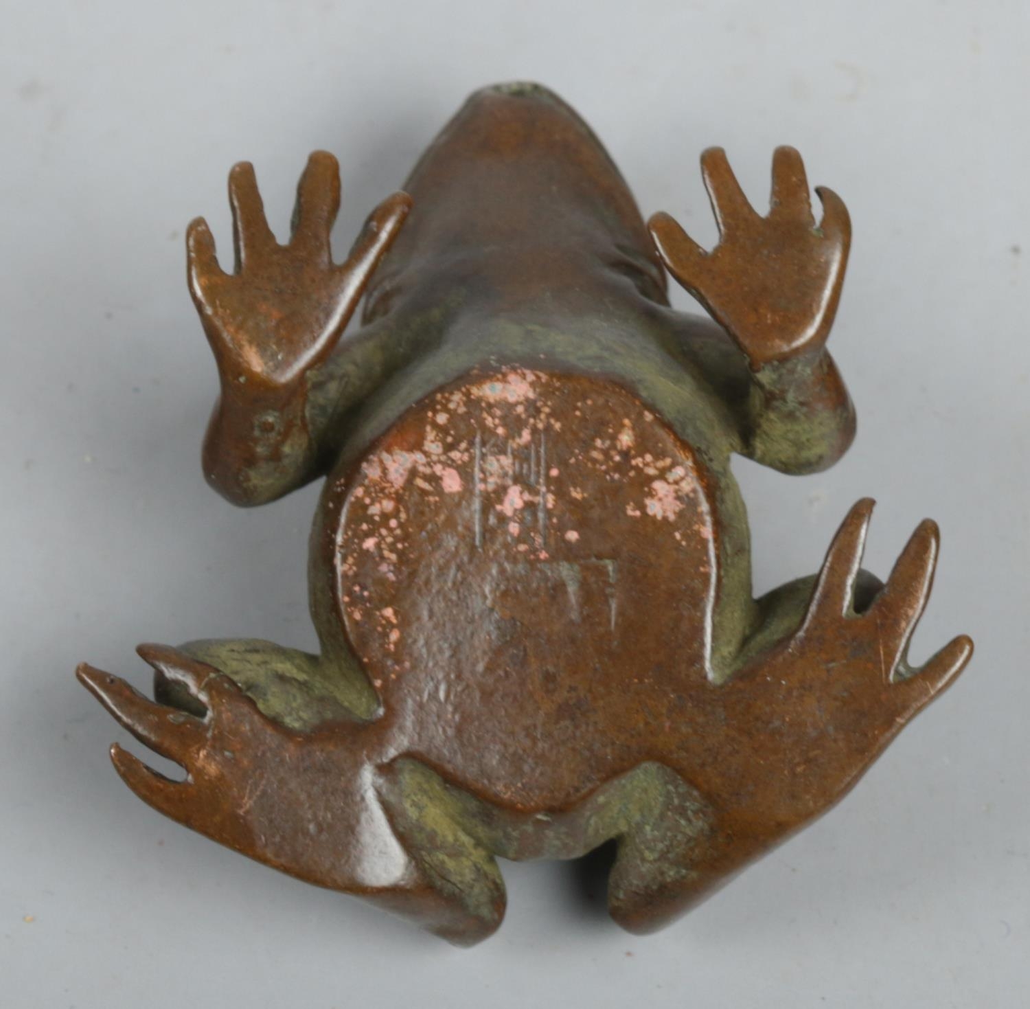 A small Japanese bronze figure of a frog. Marked to base. - Image 2 of 2