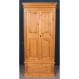 A Pine Double Door Wardrobe with Bottom Drawer. Height 203cm.