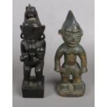 A Pair of Carved Wooden Ethnic Figures.