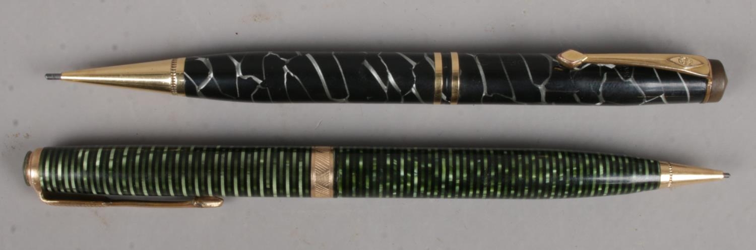 A Conway Stewart 'No 24' Cracked Ice Pencil (1933), together with a Parker Emerald Pearl Pencil (