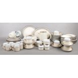 A quantity of cream Denby tea & dinnerwares. tea cups/saucers, coffee cups, teapot, dinner plates,
