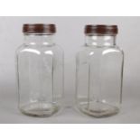 Two vintage glass 'Holland Toffee' jars with Bakelite screw lids. Has 'Best on Earth' pressed into