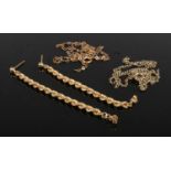 A collection of 9ct gold jewellery. Includes two necklaces and a pair of rope earrings. One necklace