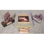 A quantity of natural minerals along with a complete minerals collectors guide.
