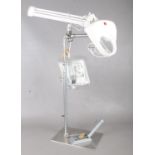 A Lowery electric lit work stand. H: 81cm.