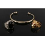 A collection of Viking style jewellery. Includes bracelet, white metal ring with black faceted stone