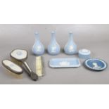 A group of Wedgwood blue Jasperware ceramic's. To include a bedroom hair brush set with Wedgwood