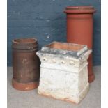 Three Terracotta Chimney Pots in Various Sizes. Tallest: 76cm.