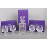 A group of Edinburgh Crystal glass ware. Decanter & 4 brandy glasses (boxed)