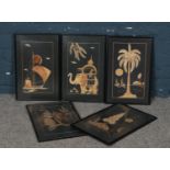 A set of five framed bamboo pictures.