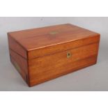 A Victorian mahogany campaign writing slope with brass inlay and drawer to side.