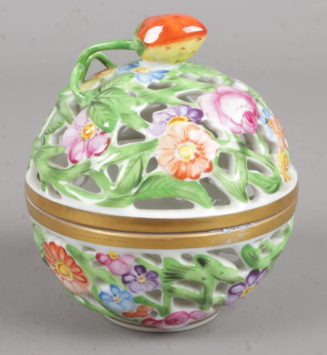 A ceramic Herend Hungary hand painted pot pourri ball. 8cm tall. Condition good.