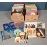 Two boxes of records. Including Led Zeppelin, Michael Jackson, Bruce Springsteen, Bon Jovi, etc.