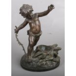 A Signed cast metal figural lamp base by L. Moreau depicting a Child holding a Stick. Foundry Mark