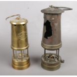 Two miners lamps. Including Lamp & Limelight Company, Hockley example, etc. Largest example has a