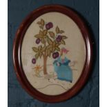 A Mahogany Framed Needlework Depicting a Lady underneath a Fruit Tree.