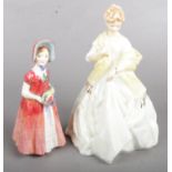 A Royal Worcester Doughty Figure (3629 - First Dance), together with A Royal Doulton Figure ( HN1986