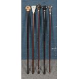 A Collection of Five Walking Sticks, some Classic Canes, all Topped with Dogs Heads.