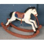 A vintage child's rocking horse.