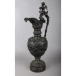 A large 19th century classical bronze ewer decorated in classical form with figures and fruiting