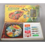 An original 1970's Matchbox scale diecast model car Crash Game. With the four cars within the