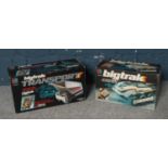 A boxed MB Electronics Bigtrak vehicle along with matching dumper accessory.