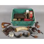 A box of collectables. Including Black Forest Bear inkwell, tinplate bird & penguin, horns,