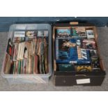 Two boxes of records, cassettes and CDs. Including John Lennon, Paul McCartney, Kinks, etc.