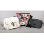 A group of handbags. Ted Baker (with dust cover), Kipling, Clarks.