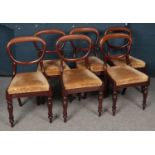 A Set of Six Victorian Mahogany Balloon Back Chairs with Fabric Seats