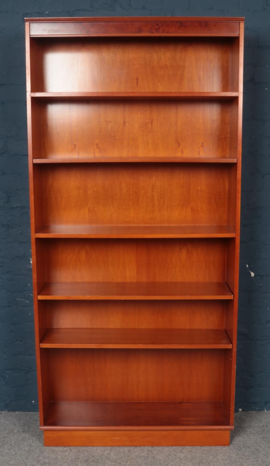 A Tall Yewwood Five Shelf Open Bookcase. Height 194cm, Width 92cm.