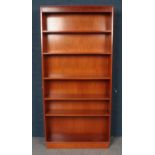 A Tall Yewwood Five Shelf Open Bookcase. Height 194cm, Width 92cm.