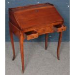 A French Style Lockable Ladies Writing Bureau. Minor damage to leather inset.