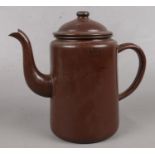 A WWII metal military teapot, baring the broad arrow mark.