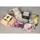 A collection of single records, music magazine and songbooks. Includes The Beatles, Ultravox,