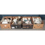 Four boxes of miscellaneous. Including Royal Albert, Wade Whimsies, ceramic dinner/teawares, table