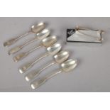 Six Silver tea spoons together with a pair of silver sugar tongs. Comprising of six silver spoons