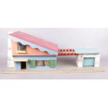 A painted retro style dolls house.