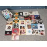 A box of approx. one hundred 7" 1980's Rock & Pop vinyl records. Artists to include, David Bowie,