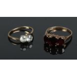 A 9ct gold 3 garnet stone ring, Size Q 3.70g along with a 9ct gold and platinum white paste