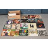 A box of approx. forty 12" Prog Rock Albums. To Include Blue Cheer, David Bowie, Barbra
