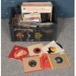 A box of LP and single records. Including Bee Gees, Rod Stewart, Neil Diamond, The Shadows, etc.