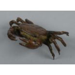 A small bronze figure of a crab.