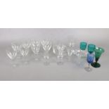 A group of nineteen various etched and coloured glasses. To include a set of eight etched wine