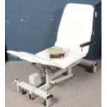 Plinth 2000 Podiatry hydraulic split leg couch.