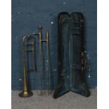 A cased Commonwealth Trombone by Dallas of London. Condition fair. The Trombone is dented around the