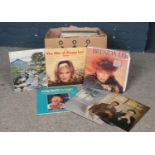 A group of LP vinyl records. The Hits of Peggy Lee, Lionel Richie, Brenda Lee etc.