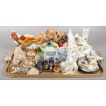 A group of mostly ceramics. Including Beswick dog, soap stone carving, crested china, novelty