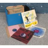 A group of 78 rpm vinyl records. Jolson Sings again, Johnnie Ray, Tony Brent etc (with record case)